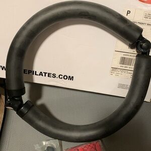 NWOT, Black Pilates Ring. Lightweight, still in original wrapping.
